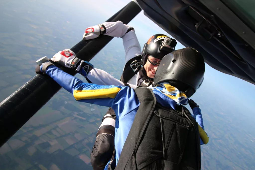 Two Skydivers Jumping out of Plane (D-EALZ, Lima Zulu)